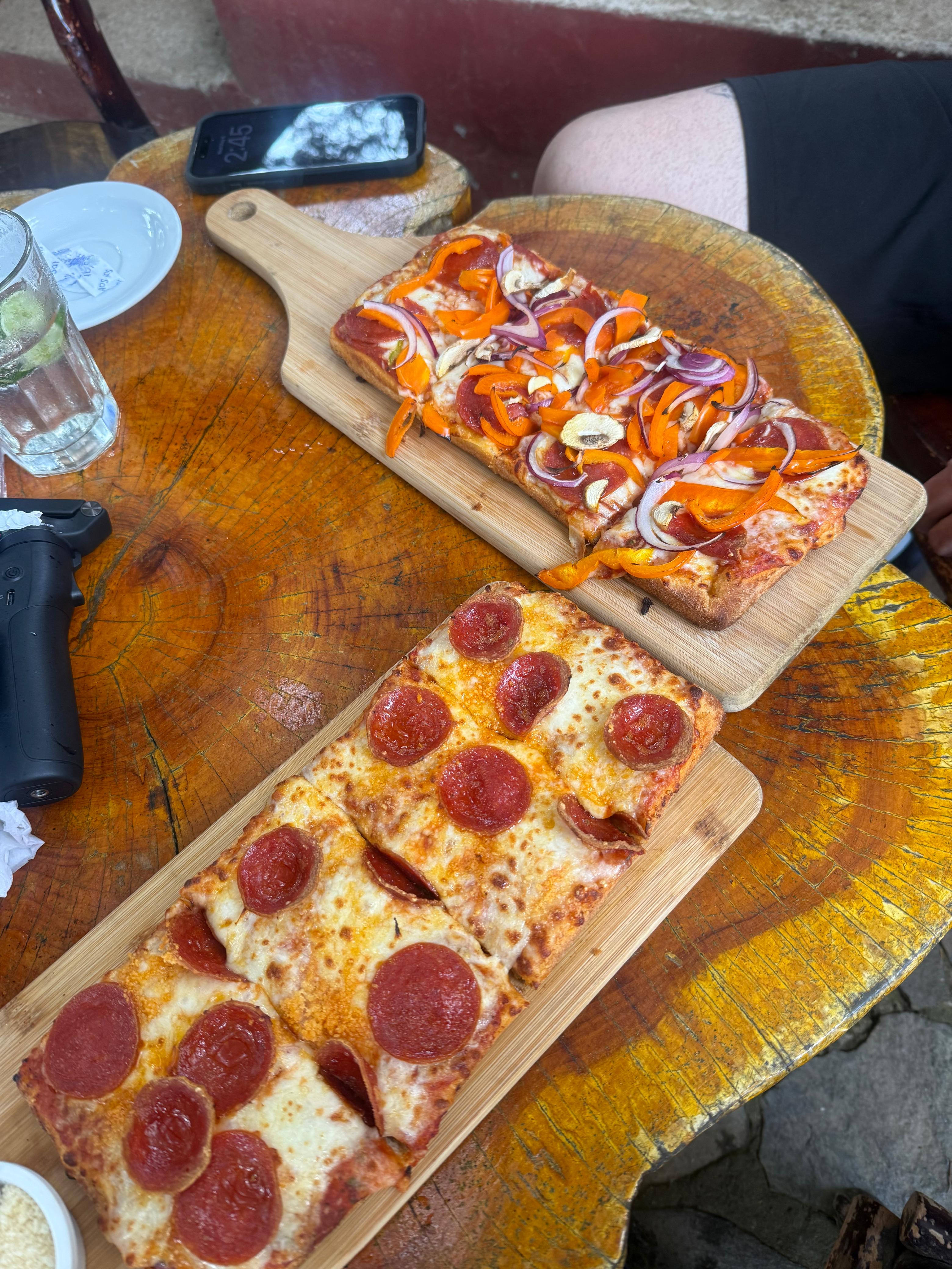 Specialty pizza with roasted peppers and mushrooms